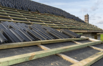 roof ceramic tile arranged in packets on the roof on roof battens