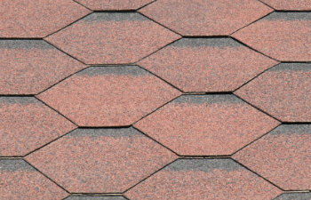 View of bituminous or composite shingles on the roof of a building
